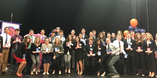 FBLA State Qualifiers holding up their plaques